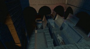 Cesta vede přes kryptu plnou rakví.