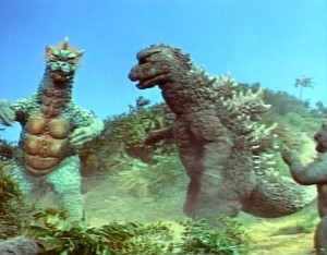 Gojira malého ochrání.